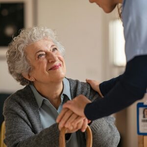 Nurse take care of senior woman